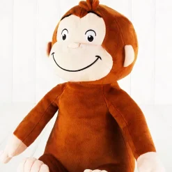 Peluche singe souriante