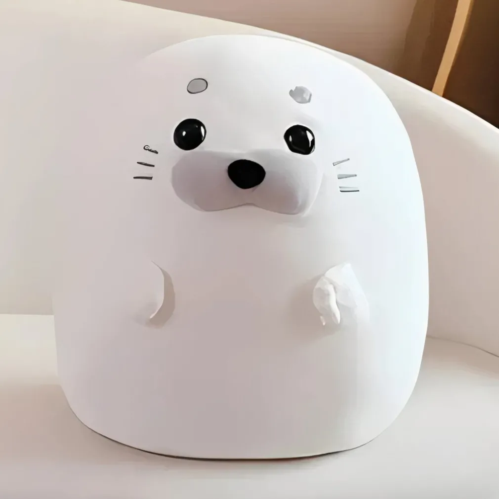 Peluche squishmallow phoque mignon