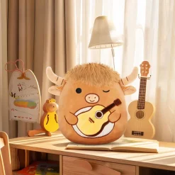 Peluche Squishmallow taureau avec guitare