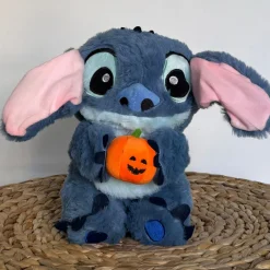 Peluche Stitch avec une citrouille qui respire