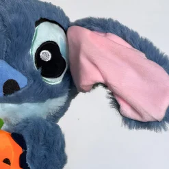 Peluche Stitch avec une citrouille qui respire