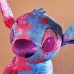 Peluche Stitch colorée rose et bleu clair Disney pour enfant