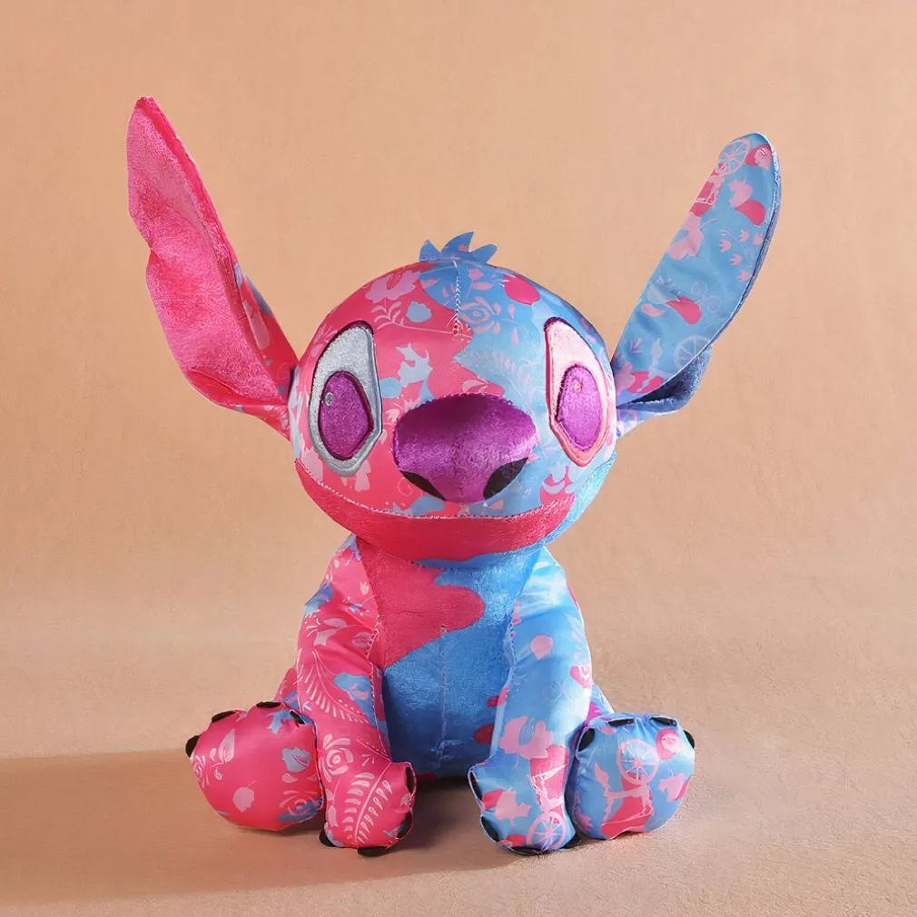 Peluche Stitch colorée rose et bleu clair Disney pour enfant