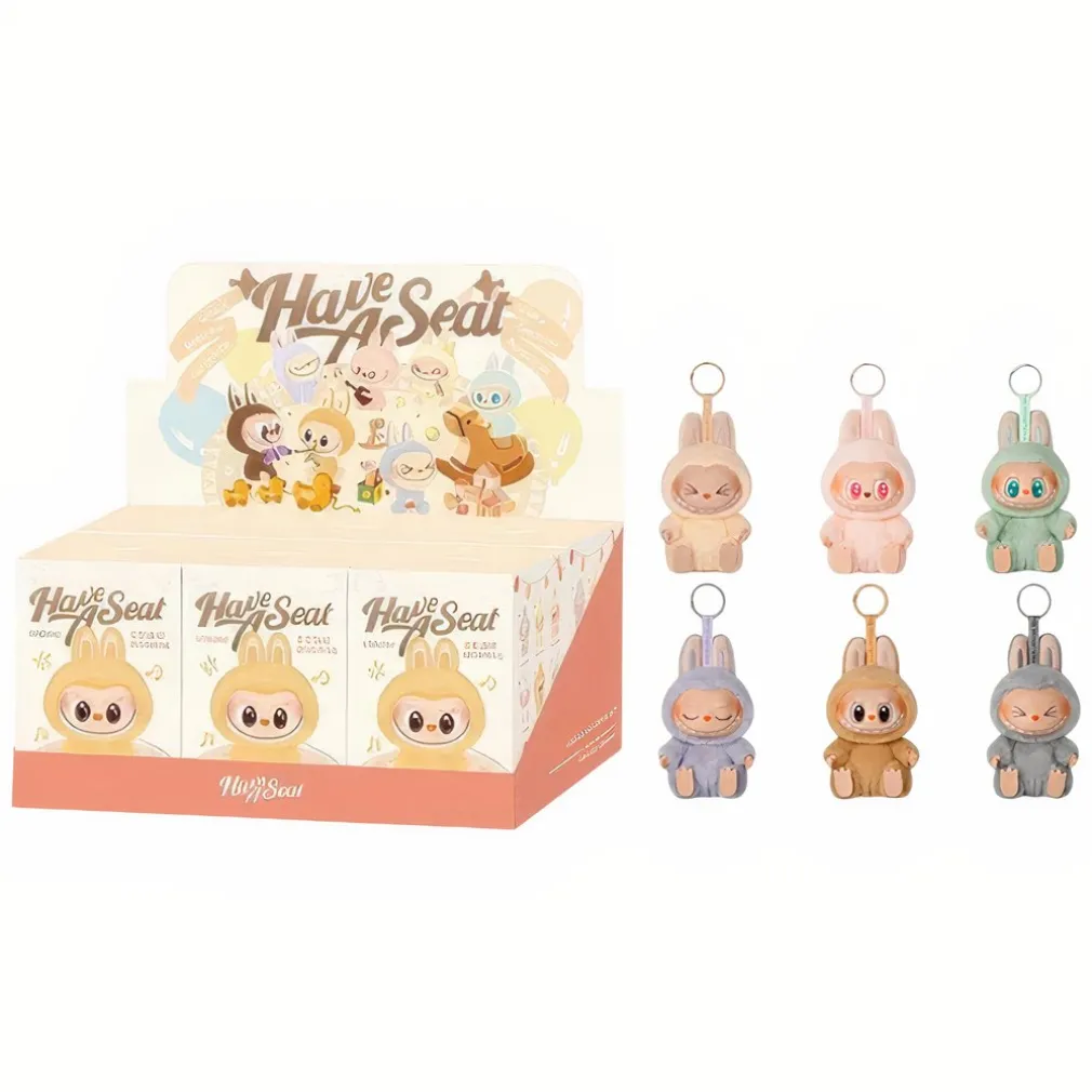 Peluche type Labubu boîte mystère assis