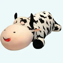 Peluche vache allongée