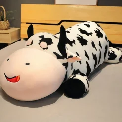 Peluche vache allongée