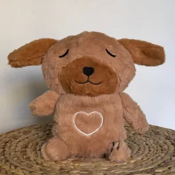 Peluche veilleuse de chien adorable qui respire