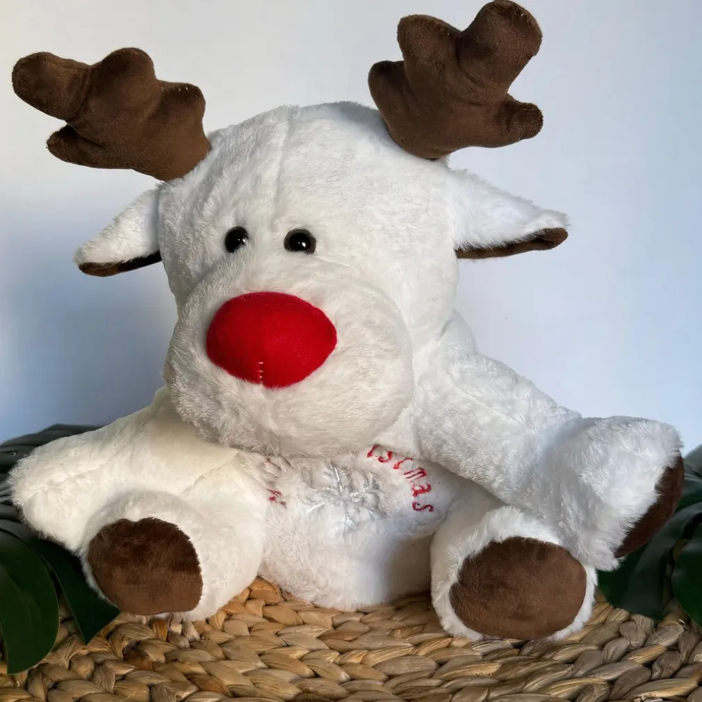 Peluche veilleuse renne de Noël qui respire avec berceuses