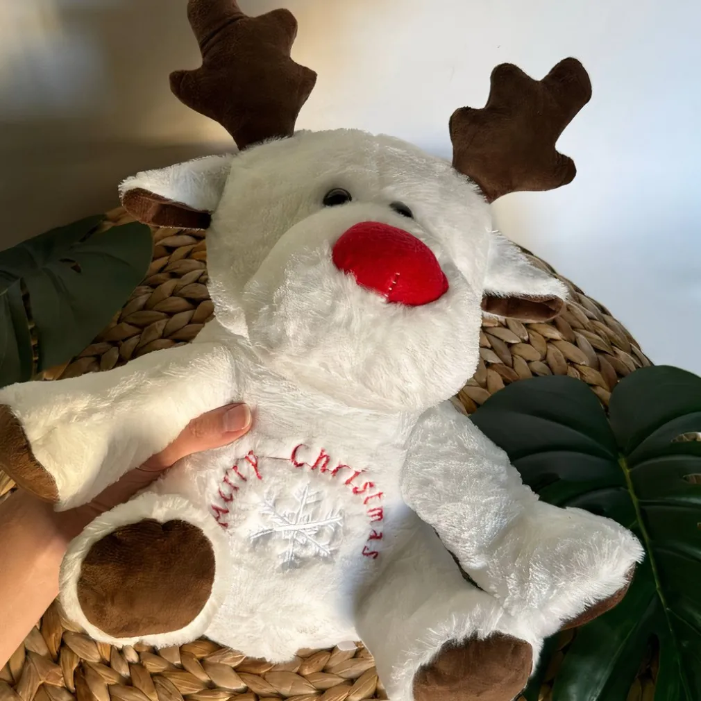 Peluche veilleuse renne de Noël qui respire avec berceuses
