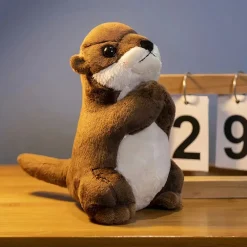 Petite peluche loutre en prière