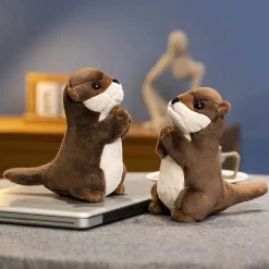 Petite peluche loutre en prière