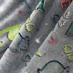 Plaid lumineux en forme de dinosaure